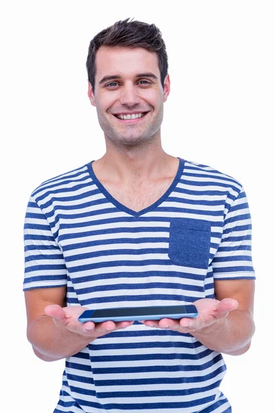 Handsome hipster holding tablet — Stock Photo, Image
