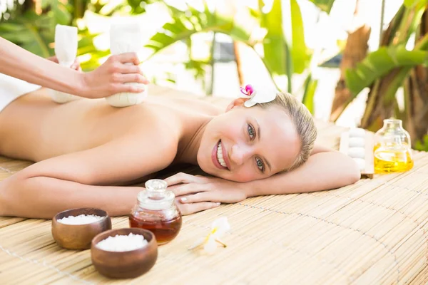 Attractive woman getting massage on her back — Stok fotoğraf