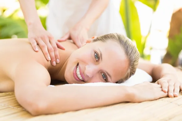 Attractive woman getting massage on her back — Stok fotoğraf