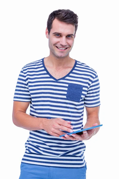 Handsome hipster holding tablet — Stock Photo, Image