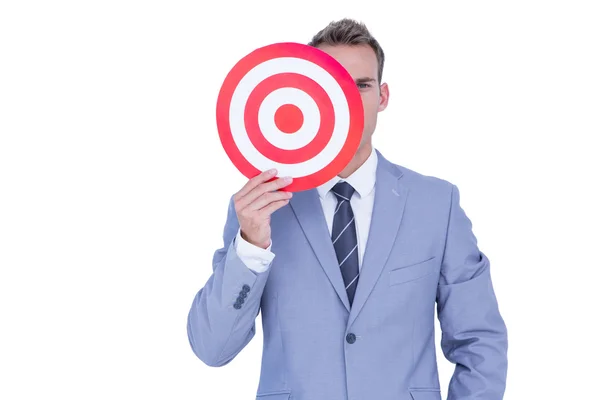 Handsome businessman holding target — Stock Photo, Image