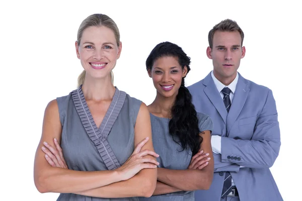 Equipo de negocios sonriendo a la cámara — Foto de Stock