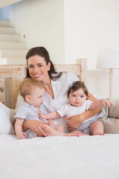 Mother with cute babies — Stock Photo, Image