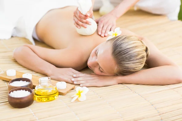 Attractive woman getting massage on her back — Stok fotoğraf