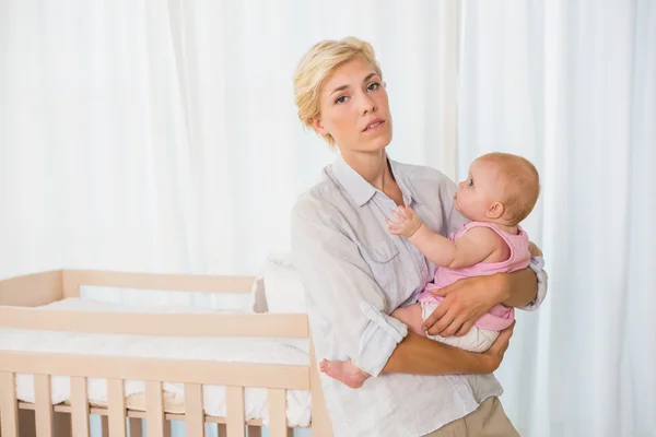 Woman holding her baby girl — Stock Photo, Image