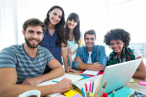 Happy creative business team looking at the camera — Stock Photo, Image