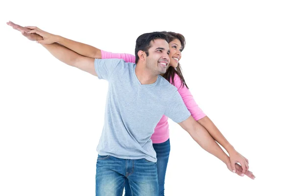 Man giving his girlfriend piggy back — Stock Photo, Image