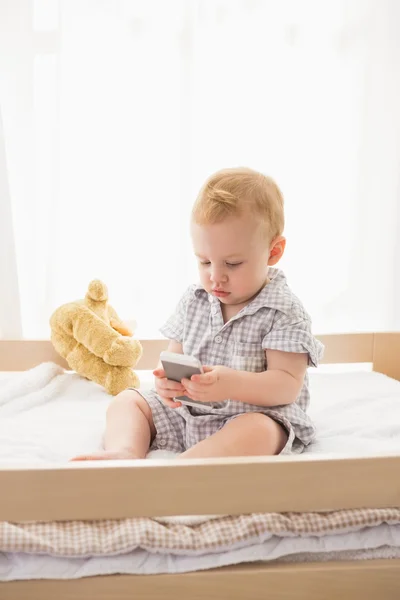 Cute baby boy in bedroom — Zdjęcie stockowe