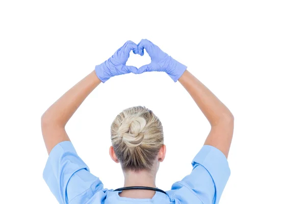 Doctor doing an heath sign — Stock Photo, Image