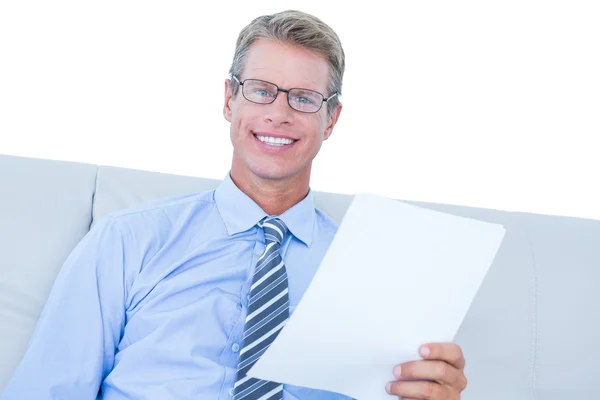 Businessman reading document at his desk — Stock Photo, Image