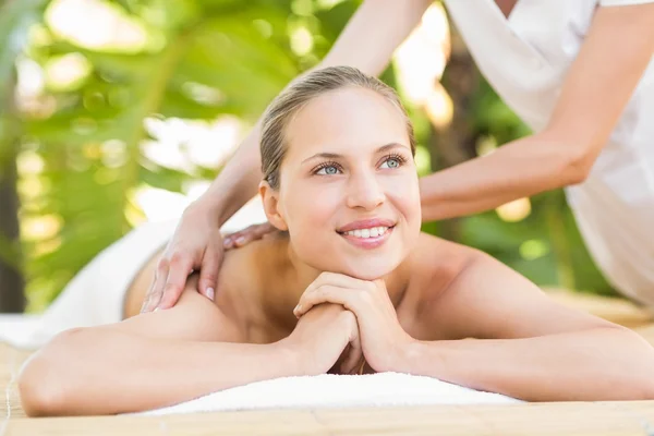 Attractive woman getting massage on her back — Stok fotoğraf