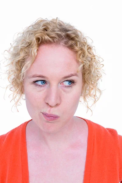 Blonde woman grimacing in front of camera — Stock Photo, Image