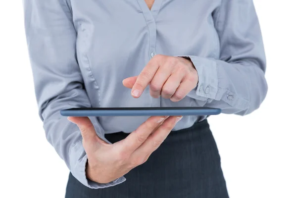 Businesswoman using her tablet — Stock Photo, Image