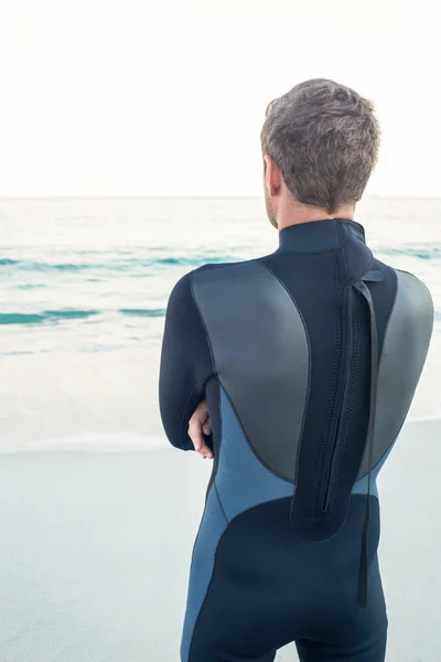 Man in wetsuit on a sunny day — Stock Photo, Image