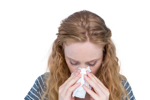 Sick woman blowing her nose — Stock Photo, Image