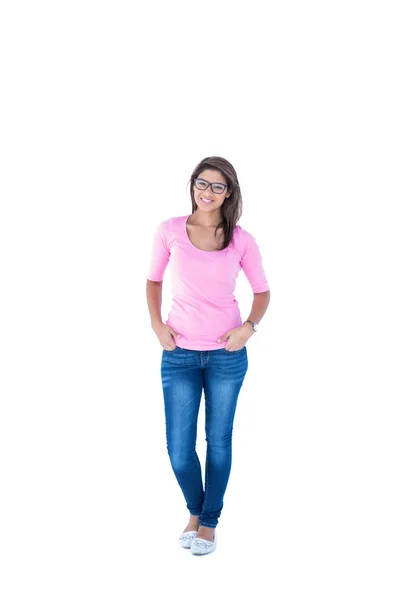 Brunette wearing glasses with hands in pocket — Stock Photo, Image