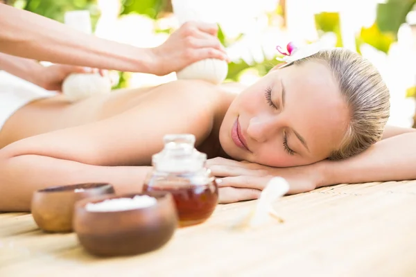 Attractive woman getting massage on her back — Stock Photo, Image