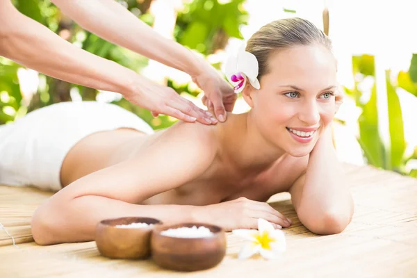 Attractive woman getting massage on her back — Stok fotoğraf