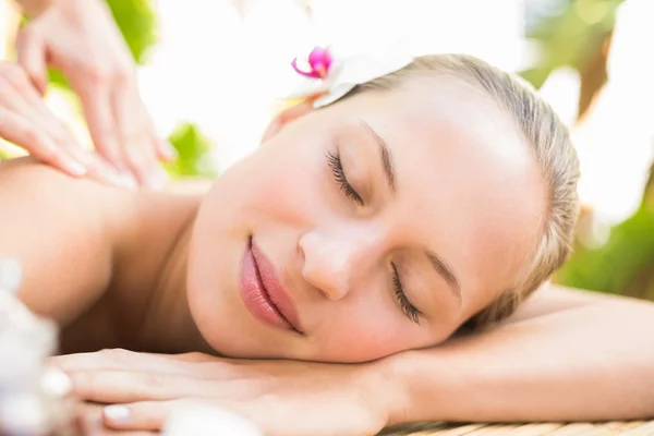 Attractive woman getting massage on her back — Stok fotoğraf