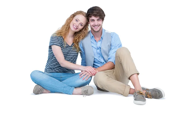 Šťastný pár sedí na podlaze — Stock fotografie