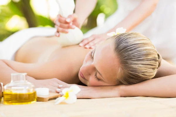 Attractive woman getting massage on her back — Stock Photo, Image
