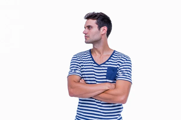 Hipster looking away with arms crossed — Stock Photo, Image