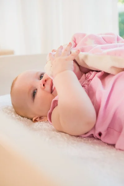 Beautiful baby girl in her crib — Stock Photo, Image