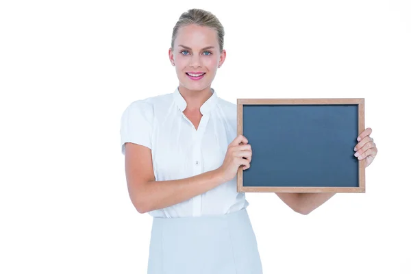 Business woman holding a black board — стоковое фото