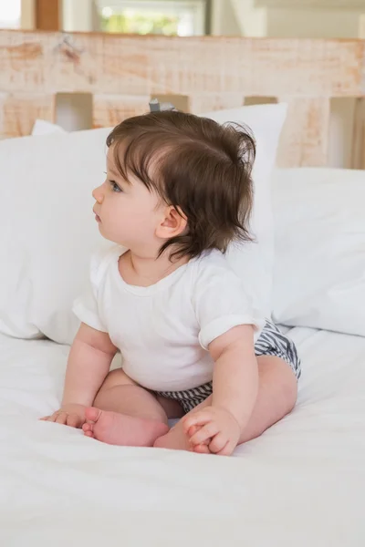 Baby girl at home in bedroom — Stok fotoğraf