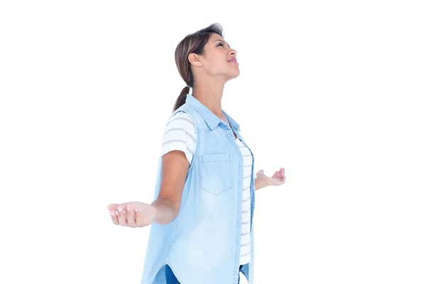 Side view of pretty brunette with arms outstretched — Stock Photo, Image