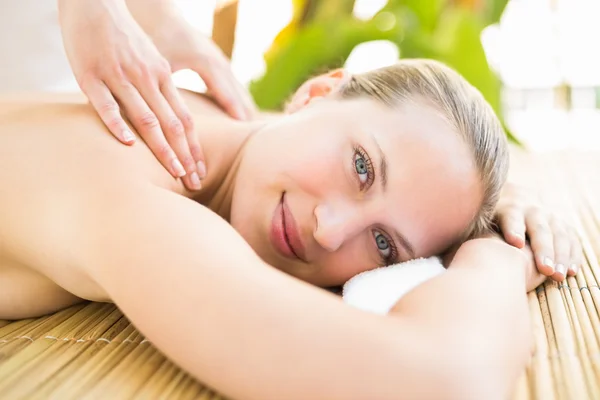 Attractive woman getting massage on her back — Stock Photo, Image