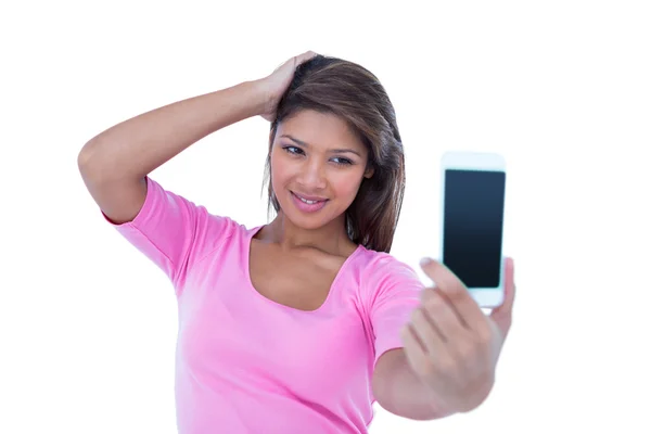 Brunette som tar selfie med smarttelefon – stockfoto