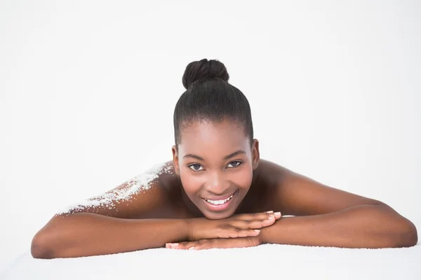 Woman with salt scrub on shoulder — Stok fotoğraf