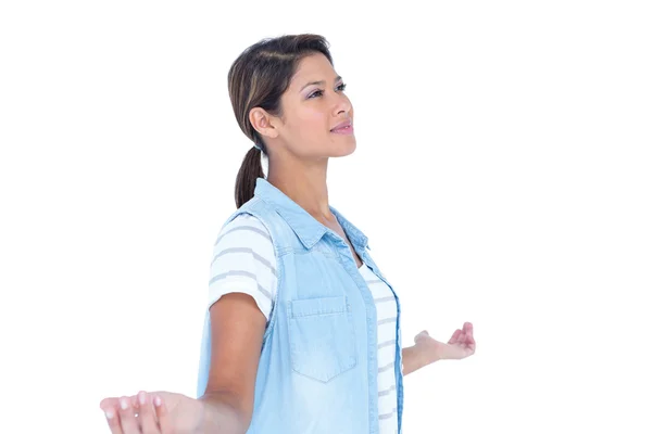 Side view of pretty brunette with arms outstretched — Stock Photo, Image