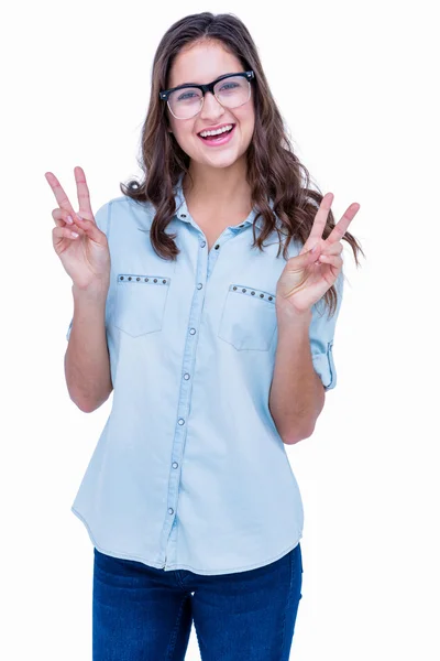 Geeky hipster making peace sign — Stock Photo, Image