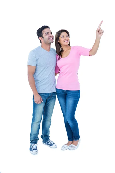 Couple standing together and looking away — Stock Photo, Image