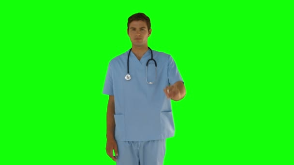 立っている外科医と図面 — ストック動画