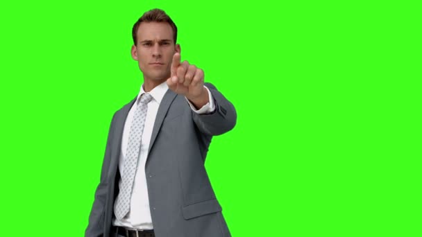 Businessman standing and pointing — Stock Video