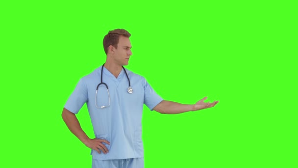 Chirurg stojący interakcji z rąk — Wideo stockowe