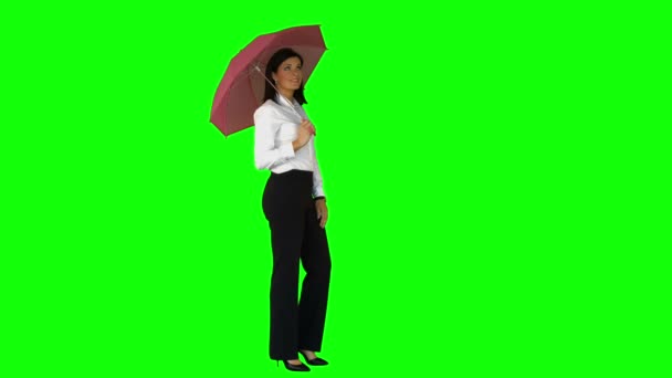 Businesswoman wearing umbrella — Stock Video