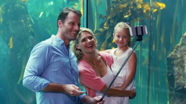 Happy family using selfie stick — Stock Video