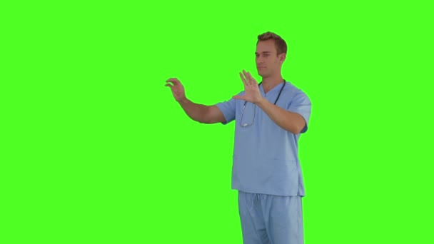 Surgeon standing interacting with hands — Stock Video