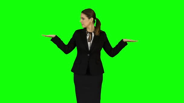 Businesswoman wearing something with her hands — Stock Video