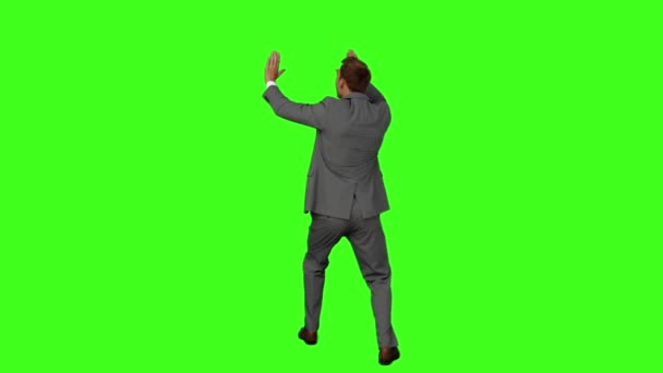 Businessman standing and cowering — Stock Video