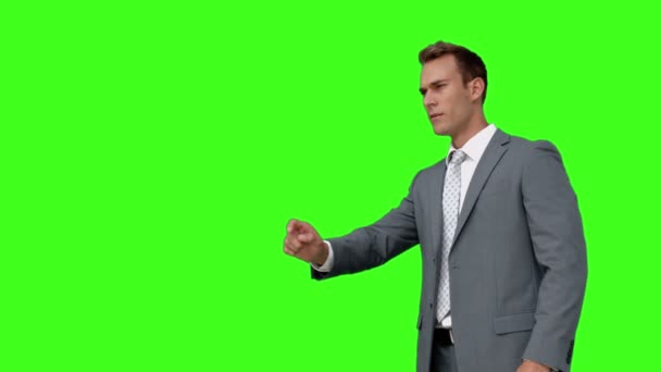 Businessman standing and pointing — Stock Video