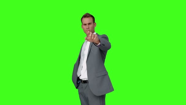 Businessman standing and pointing — Stock Video