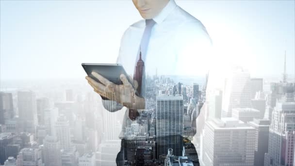 Businessman using tablet with cityscape overlay — Stock Video