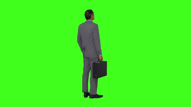 Businessman standing and thinking — Stock Video