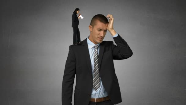 Boss yelling on businessman with megaphone — Stock Video