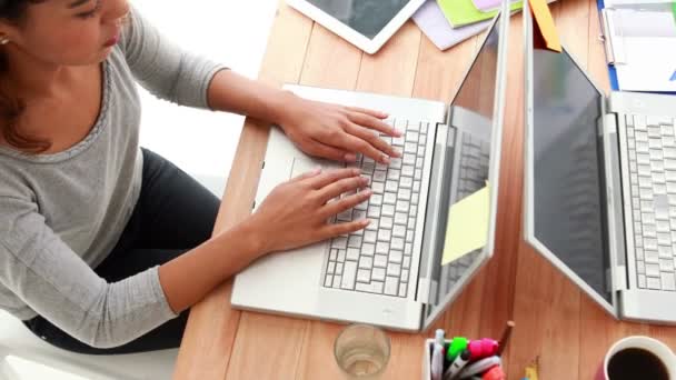 Businesswoman working on laptop at office — Stock Video